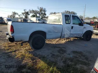 2003 Ford F-250 XL with VIN 1FTNX20L73EC70163, listed as a Copart auction lot 77061204 with 387,321 mi miles and Salvage title. Bid and sale history available at DreamBid. Image 3.