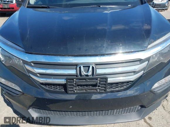 2016 Honda Pilot EX-L with VIN 5FNYF5H57GB023852, listed as a IAAI auction lot 41811412 with 151,707 mi miles and . Bid and sale history available at DreamBid. Image 6.
