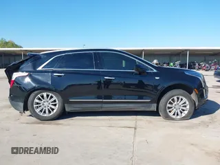 2019 Cadillac XT5 FWD with VIN 1GYKNARS7KZ117913, listed as a IAAI auction lot 41228767 with 105,335 mi miles and . Bid and sale history available at carsss.com. Image 13.