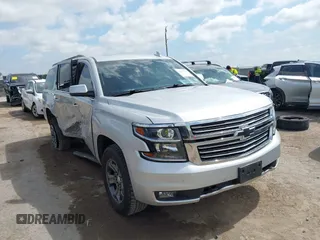 2019 Chevrolet Suburban LT with VIN 1GNSKHKC6KR262748, listed as a IAAI auction lot 42573141 with 137,301 mi miles and . Bid and sale history available at DreamBid. Image 1.