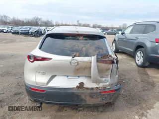 2023 Mazda CX-30 S Premium with VIN 3MVDMBDMXPM563500, listed as a IAAI auction lot 42092423 with 9,148 mi miles and . Bid and sale history available at DreamBid. Image 17.