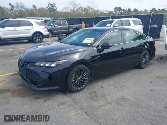 2021 Toyota Avalon Hybrid XSE z VIN 4T1EA1AB2MU002741, wystawiony jako IAAI lot #41865444 z przebiegiem 141 196 mil mil oraz . Historia ofert i sprzedaży dostępna na DreamBid. Obrazek 17.