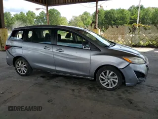 2013 Mazda 5 Sport with VIN JM1CW2BL1D0153300, listed as a Copart auction lot 69431424 with 99,542 mi miles and Salvage Title. Bid and sale history available at DreamBid. Image 4.