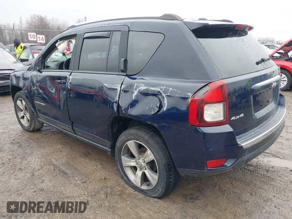2016 Jeep Compass High Altitude Edition with VIN 1C4NJDEB0GD696124, listed as a IAAI auction lot 41973334 with 67,056 mi miles. Bid and sale history available at carsss.com. Image 3.