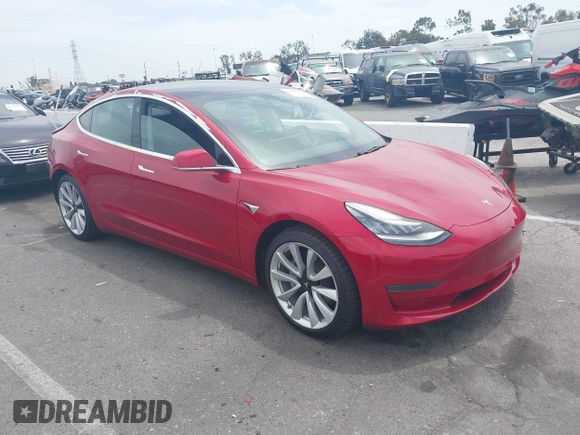 2020 Tesla Model 3 Standard Range Plus z VIN 5YJ3E1EA7LF806266, wystawiony jako IAAI lot #42242694 z przebiegiem 42 044 mil mil oraz . Historia ofert i sprzedaży dostępna na DreamBid. Obrazek 1.