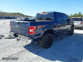 2020 Ford F-150 XL with VIN 1FTEW1E47LKF33607, listed as a IAAI auction lot 41849772 with 101,536 mi miles. Bid and sale history available at carsss.com. Image 4.