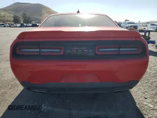 2020 Dodge Challenger SXT with VIN 2C3CDZAG3LH211327, listed as a Copart auction lot 54799735 with 54,104 mi miles and Salvage Title. Bid and sale history available at DreamBid. Image 6.
