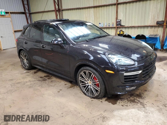 2017 Porsche Cayenne GTS with VIN WP1AD2A25HLA80201, listed as a Copart auction lot 77460464 with 185,501 mi miles and Clean title. Bid and sale history available at DreamBid. Image 4.