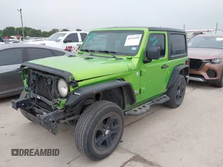 2020 Jeep Wrangler Sport S with VIN 1C4GJXAG1LW103235, listed as a IAAI auction lot 42126250 with 64,986 mi miles and . Bid and sale history available at DreamBid. Image 2.