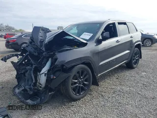 2018 Jeep Grand Cherokee Laredo E with VIN 1C4RJFAG0JC120383, listed as a IAAI auction lot 42115098 with Not Provided miles and . Bid and sale history available at DreamBid. Image 21.