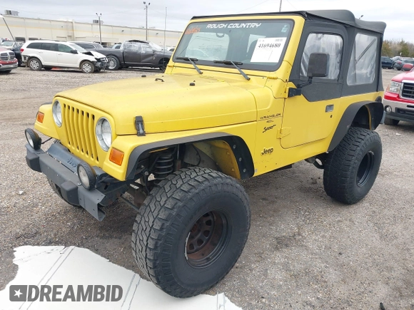 2000 Jeep Wrangler Sport with VIN 1J4FA49S0YP781831, listed as a IAAI auction lot 41694680 with 250,108 mi miles and . Bid and sale history available at DreamBid. Image 2.
