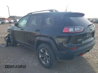 2019 Jeep Cherokee Trailhawk Elite with VIN 1C4PJMBX4KD385796, listed as a IAAI auction lot 41557577 with 55,700 mi miles. Bid and sale history available at carsss.com. Image 3.