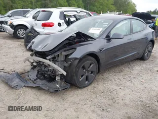 2022 Tesla Model 3 Long Range z VIN 5YJ3E1EB8NF315359, wystawiony jako IAAI lot #42035599 z przebiegiem 54 974 mil mil oraz . Historia ofert i sprzedaży dostępna na DreamBid. Obrazek 22.
