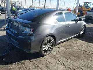 2016 Scion tC with VIN JTKJF5C78GJ014184, listed as a IAAI auction lot 41622575 with 128,520 mi miles. Bid and sale history available at carsss.com. Image 4.