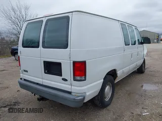 2000 Ford Econoline Cargo with VIN 1FTRE14W2YHB25933, listed as a IAAI auction lot 41912248 with 57,561 mi miles. Bid and sale history available at carsss.com. Image 4.