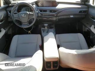 2022 Lexus UX with VIN JTHX3JBH1N2051189, listed as a Copart auction lot 49733245 with 33,265 mi miles and Salvage Title. Bid and sale history available at carsss.com. Image 8.