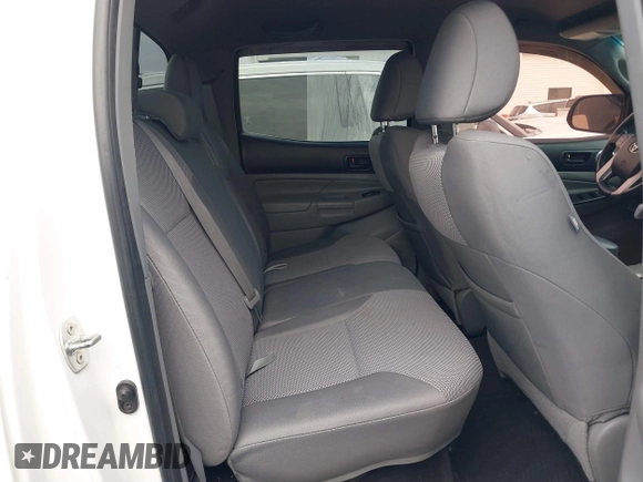 2013 Toyota Tacoma z VIN 5TFLU4EN2DX076815, wystawiony jako IAAI lot #41344839 z przebiegiem 311 083 mil mil oraz . Historia ofert i sprzedaży dostępna na DreamBid. Obrazek 8.