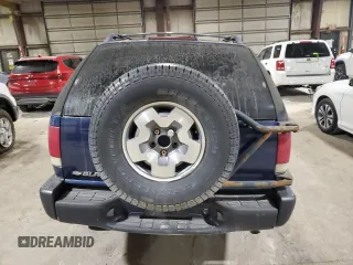 2001 Chevrolet Blazer LS z VIN 1GNCT18W01K143093, wystawiony jako Copart lot #82650514 z przebiegiem Nie podano mil oraz Szkoda całkowita • Salvage title. Historia ofert i sprzedaży dostępna na DreamBid. Obrazek 6.