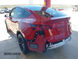 2020 Tesla Model Y Long Range with VIN 5YJYGDEE0LF029496, listed as a IAAI auction lot 41977695 with 47,958 mi miles and . Bid and sale history available at DreamBid. Image 3.
