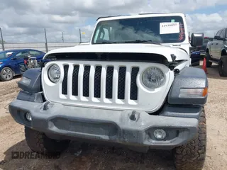 2018 Jeep Wrangler Unlimited Sport S z VIN 1C4HJXDG4JW298647, wystawiony jako IAAI lot #41930817 z przebiegiem 64 761 mil mil oraz . Historia ofert i sprzedaży dostępna na DreamBid. Obrazek 12.