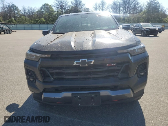 2023 Chevrolet Colorado 4WD Z71 with VIN 1GCPTDEK5P1228331, listed as a Copart auction lot 60892315 with 22,527 mi miles and Salvage title. Bid and sale history available at DreamBid. Image 5.