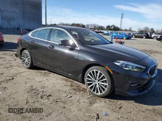 2021 BMW 2 Series 228i xDrive with VIN WBA73AK09M7H17065, listed as a Copart auction lot 83199304 with 42,710 mi miles and Salvage title. Bid and sale history available at DreamBid. Image 4.