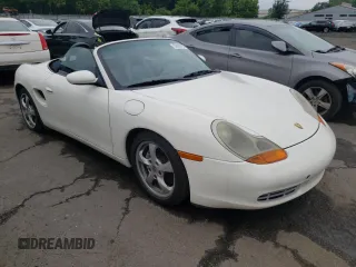 2001 Porsche Boxster z VIN WP0CA29821U622592, wystawiony jako Copart lot #56050735 z przebiegiem Nie podano mil oraz Szkoda całkowita • Salvage title. Historia ofert i sprzedaży dostępna na DreamBid. Obrazek 4.