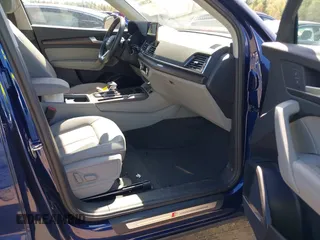 2023 Audi Q5 S line Premium Plus z VIN WA1EAAFY4P2052682, wystawiony jako IAAI lot #42118016 z przebiegiem 24 135 mil mil oraz . Historia ofert i sprzedaży dostępna na DreamBid. Obrazek 5.