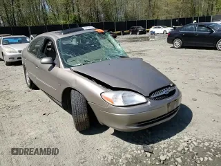 2003 Ford Taurus SEL Deluxe with VIN 1FAHP56SX3G199970, listed as a Copart auction lot 53042795 with 212,802 mi miles and Salvage Title. Bid and sale history available at DreamBid. Image 10.