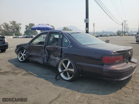 1995 Chevrolet Caprice Classic with VIN 1G1BL52P9SR165706, listed as a Copart auction lot 70677974 with NaN miles and Salvage Title. Bid and sale history available at carsss.com. Image 2.