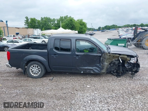 2015 Nissan Frontier SL with VIN 1N6AD0EV1FN764719, listed as a IAAI auction lot 42512771 with 104,572 mi miles and . Bid and sale history available at DreamBid. Image 14.