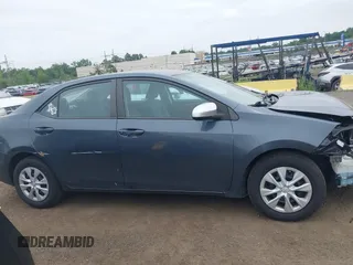 2014 Toyota Corolla L with VIN 2T1BURHE5EC027497, listed as a IAAI auction lot 42602880 with 101,094 mi miles and . Bid and sale history available at DreamBid. Image 13.