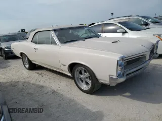 1966 Pontiac GTO z VIN 242676P246352, wystawiony jako Copart lot #75298684 z przebiegiem 79 942 mil mil oraz Szkoda całkowita • Salvage title. Historia ofert i sprzedaży dostępna na DreamBid. Obrazek 4.