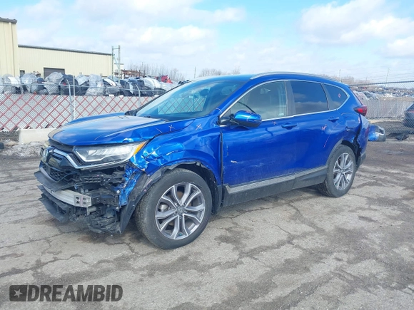 2020 Honda CR-V Touring with VIN 7FARW2H91LE012284, listed as a IAAI auction lot 41672460 with 28,207 mi miles and . Bid and sale history available at DreamBid. Image 20.