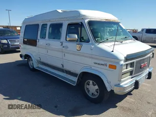 1995 GMC Vandura z VIN 1GDEG25K3SF542874, wystawiony jako IAAI lot #41792770 z przebiegiem 176 778 mil mil oraz . Historia ofert i sprzedaży dostępna na DreamBid. Obrazek 1.