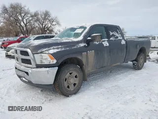 2014 Ram 2500 SLT with VIN 3C6TR5JT5EG203839, listed as a IAAI auction lot 41277795 with 135,344 mi miles and . Bid and sale history available at DreamBid. Image 2.