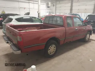 1995 Toyota T100 DX with VIN JT4VD12E0S0013715, listed as a IAAI auction lot 42140145 with 276,371 mi miles. Bid and sale history available at carsss.com. Image 4.