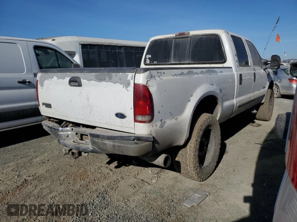 2002 Ford F-250 XL with VIN 1FTNW20F12EA44390, listed as a Copart auction lot 83888084 with 285,250 mi miles and Salvage Title. Bid and sale history available at DreamBid. Image 3.