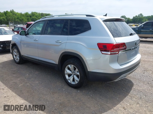 2018 Volkswagen Atlas SE with VIN 1V2DR2CAXJC521412, listed as a IAAI auction lot 42309661 with 99,045 mi miles and . Bid and sale history available at DreamBid. Image 3.