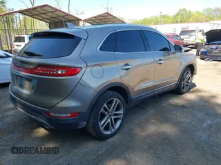 2019 Lincoln MKC Reserve with VIN 5LMCJ3D93KUL53163, listed as a IAAI auction lot 42097105 with 71,066 mi miles and . Bid and sale history available at DreamBid. Image 4.