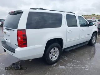 2012 Chevrolet Suburban LT with VIN 1GNSCJE00CR165813, listed as a IAAI auction lot 42494042 with 205,998 mi miles and . Bid and sale history available at DreamBid. Image 4.