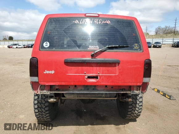 1999 Jeep Cherokee Sport with VIN 1J4FF68S6XL574980, listed as a Copart auction lot 51639635 with 257,854 mi miles and Salvage Title. Bid and sale history available at carsss.com. Image 6.
