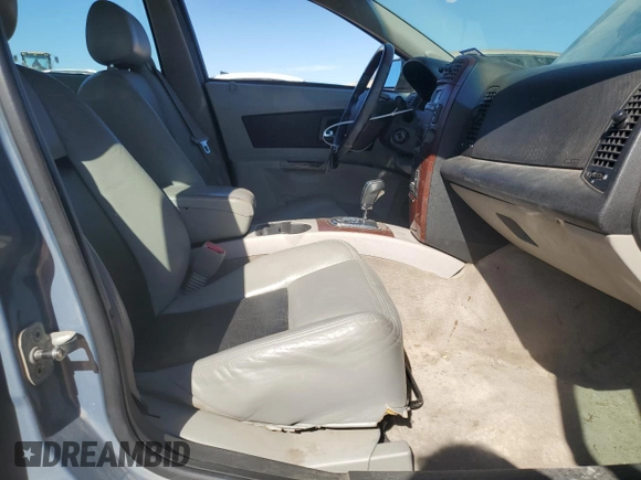 2007 Cadillac CTS with VIN 1G6DP577070161443, listed as a Copart auction lot 81595664 with 129,464 mi miles and Salvage Title. Bid and sale history available at DreamBid. Image 7.