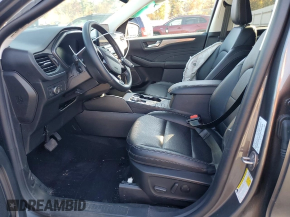 2022 Ford Escape Titanium Plug-In Hybrid with VIN 1FMCU0LZ8NUB74213, listed as a Copart auction lot 77133004 with 18,490 mi miles and Salvage title. Bid and sale history available at DreamBid. Image 7.