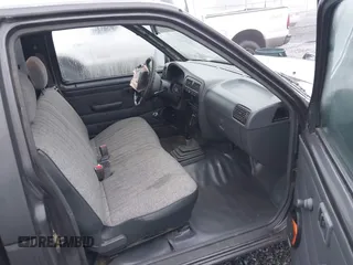 1997 Nissan Frontier XE with VIN 1N6SD11S7VC319806, listed as a IAAI auction lot 41349741 with 215,812 mi miles and . Bid and sale history available at DreamBid. Image 5.
