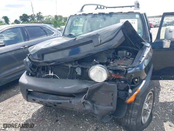 2013 Toyota FJ Cruiser with VIN JTEBU4BF2DK173157, listed as a IAAI auction lot 39718611 with 178,886 mi miles. Bid and sale history available at carsss.com. Image 6.