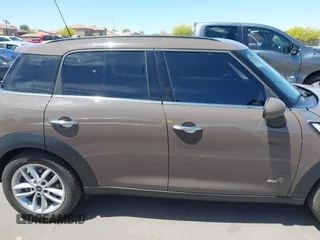 2013 MINI Countryman S ALL4 with VIN WMWZC5C54DWP34224, listed as a IAAI auction lot 42141400 with 33,307 mi miles and . Bid and sale history available at DreamBid. Image 13.