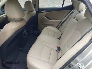 2014 Kia Optima EX z VIN 5XXGN4A70EG335090, wystawiony jako IAAI lot #42272655 z przebiegiem 165 795 mil mil oraz . Historia ofert i sprzedaży dostępna na DreamBid. Obrazek 8.