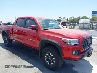 2021 Toyota Tacoma SR5 z VIN 3TMDZ5BN5MM113099, wystawiony jako IAAI lot #42319169 z przebiegiem 25 000 mil mil oraz . Historia ofert i sprzedaży dostępna na DreamBid. Obrazek 1.