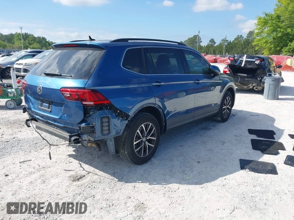 2019 Volkswagen Tiguan SE with VIN 3VV3B7AX2KM006055, listed as a IAAI auction lot 42023713 with 83,570 mi miles and . Bid and sale history available at DreamBid. Image 4.